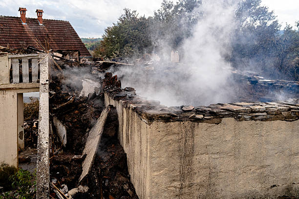 Professional Fire Damage Restoration technician working in Hightstown, NJ